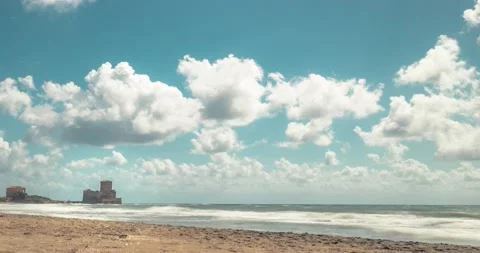 4K Timelapse of the clouds and the waves at the beach Torre Astura, Rome, Italy Stock Footage 209499743