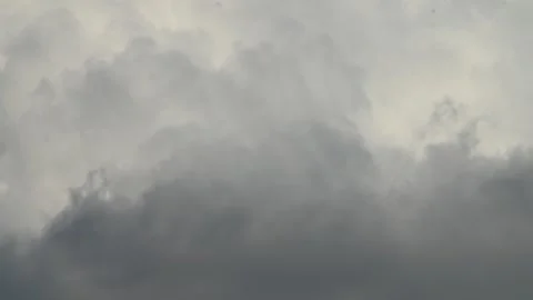 4K Timelapse of clouds on blue sky during rainy day, close shot Stock Footage 254675991
