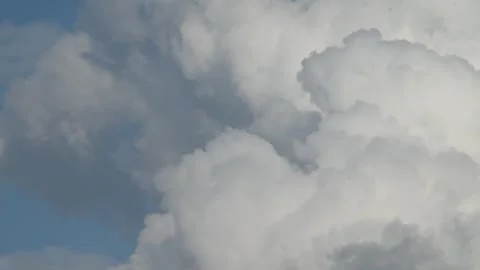 4K Timelapse of clouds on blue sky during rainy day, close shot Stock Footage 254977720