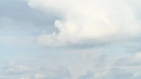 4K Timelapse of clouds on blue sky during rainy day Stock Footage 254977933