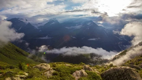 4k timelapse clouds formation in mountains Sunbeams Video stock 88192353