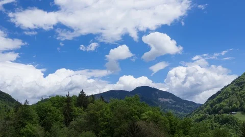 4K timelapse - clouds forming over green mountains in the Alps 動画素材 88245639