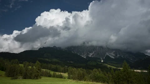 4k Timelapse of clouds forming over a rugged mountain in the Dolomites Stock Footage 138275490