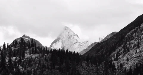 4k timelapse clouds mass rolling over Tibet snow-Covered mountains. Stock Footage 45852504