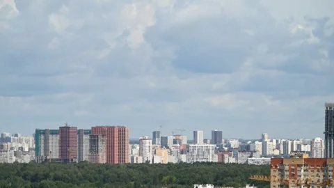 4K Timelapse clouds over city view, buildings, construction Stock Footage 247487150