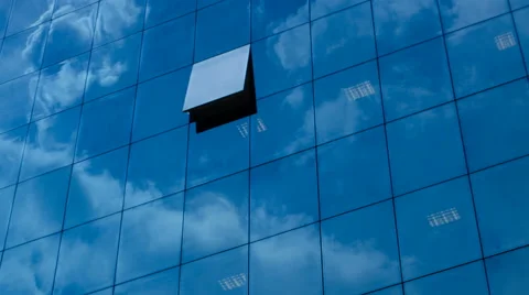 4K Timelapse Of Clouds Reflected In Corporate Office Building Stock Footage