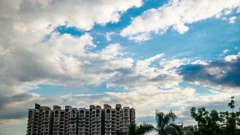 4K Timelapse of Clouds Running Across the blue sky at Sunset. Stock Footage 138097865