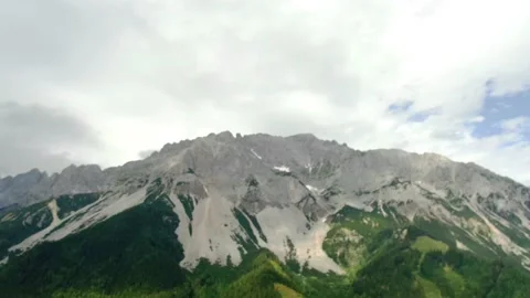 4K - timelapse of clouds rushing over Austrian mountain Video stock 130525208
