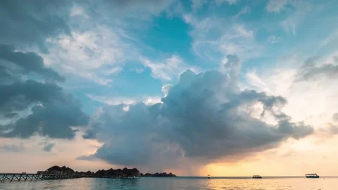 4K Timelapse, cloudy Maldives sunset with rain clouds Stock Footage 130433307