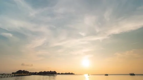 4K Timelapse, cloudy orange Maldives sunset Stock Footage 130433298