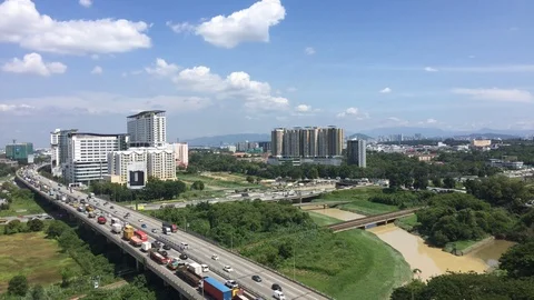 4K timelapse of cloudy sky and vehicles on highway. Stock Footage 101736023