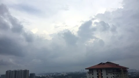 4K timelapse of cloudy sky top of rooftop. Stock Footage 101562181