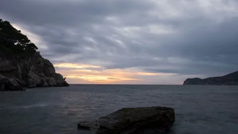 4K timelapse of cloudy sunset Mallorca, Spain Stock Footage 83829266