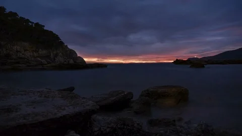 4K timelapse of cloudy sunset Mallorca, Spain Stock Footage 83829331