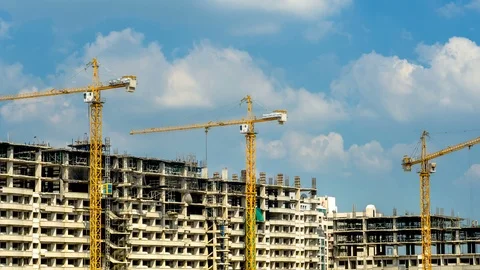 4k timelapse of construction site. Cranes working on construct building Stock Footage 104158381