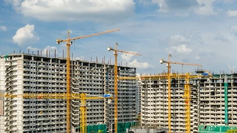4k timelapse of construction site. Cranes working on construct building . Stock Footage 104713585