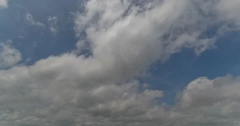 4K Timelapse of Cumulus Clouds looking west Stock Footage 65237033