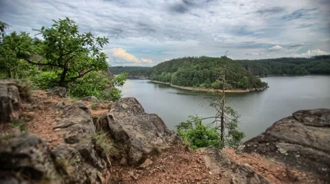 4K timelapse with dam, rocks and cloudy sky Stock Footage 67627452