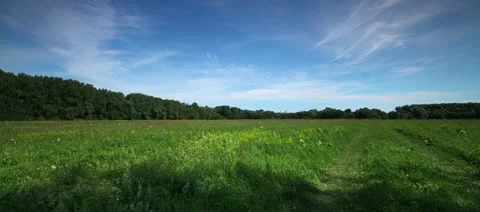 4k  timelapse dark clouds above field. shot motorized slider. Vídeos de archivo 10791415