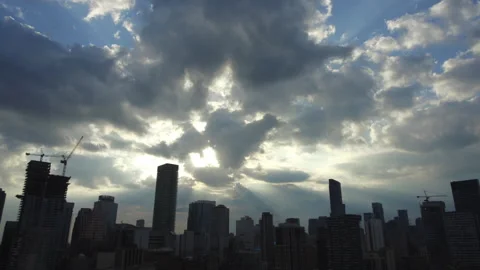 4K Timelapse of dark clouds during sunset over downtown Toronto Stock Footage 133394424