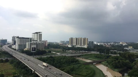 4K timelapse of dark cloudy sky and vehicles on highway. Stock Footage 101735730