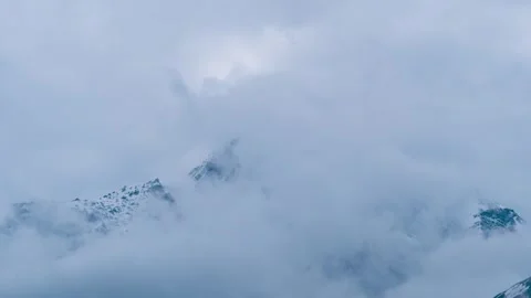 4K Timelapse of dark stormy clouds moving above Himalaya mountain during winter  Stock Footage 294088158