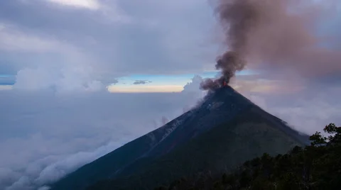 4k Timelapse of dramatic Fuego Volcano Eruption in Guatemala at Sunset Stock Footage 64669447