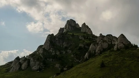 4k timelapse of dynamic white clouds over cliffs in Ciucas Mountains. Stock Footage 77483549