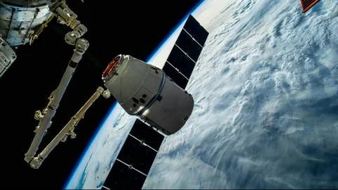 4K Timelapse of Earth seen from space featuring Crew Dragon docking to The ISS. Stock Footage 155769153