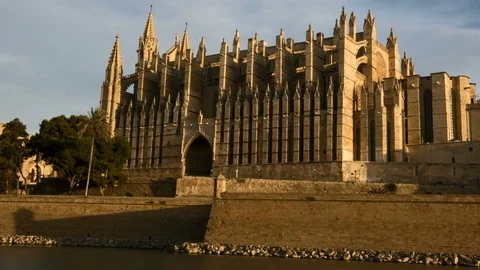 4K timelapse of Facade of the Palma de Mallorca, Seu, at sunrise Video stock 83829726