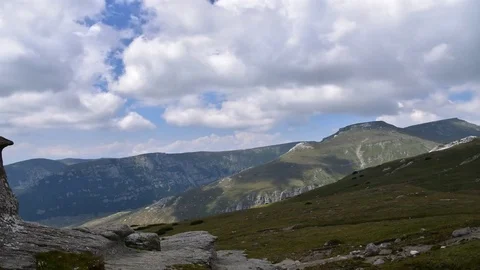 4K Timelapse of fast moving clouds over Bucegi mountains range, Romania Stock Footage 82178151