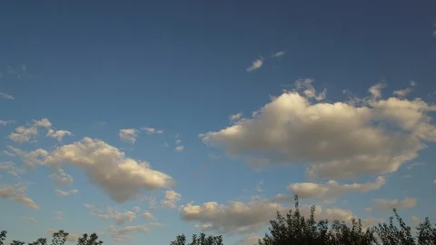 4K Timelapse of Fast Moving Clouds in Blue Sunny Sky, Time Lapse Stock Footage 115911362