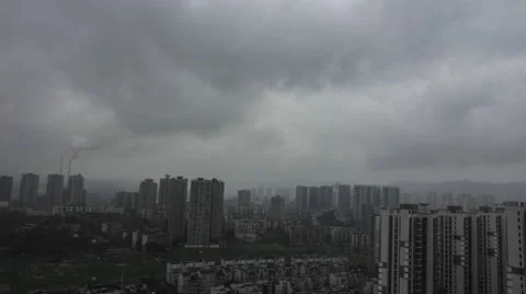 4k timelapse of fast moving dark clouds above Chongqing city in China Stock Footage 47422085