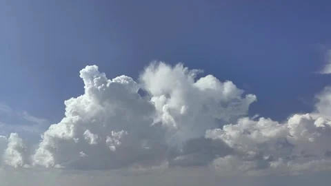 4K Timelapse Flowing Clouds In The Sky White Clouds Moving Fast Sky. Stock Footage 321574563