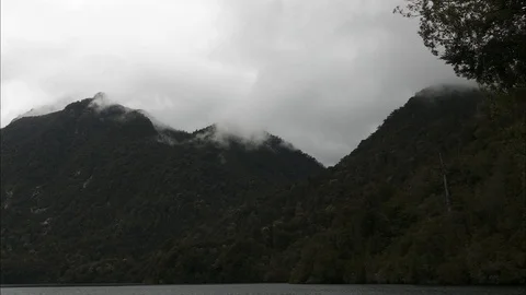 4K timelapse of a forest hill and cloud formation in southern Chile Stock Footage 123046413