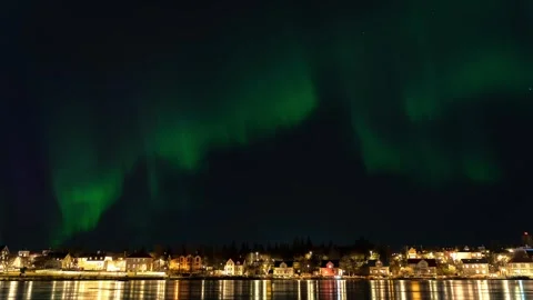 4K Timelapse of Green Aurora Borealis over Reykjavik Lake with City Houses,.. Stock Footage 327416519