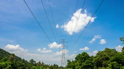 4k timelapse High voltage electric tower on the mountain and blue sky background Stock Footage 91070345