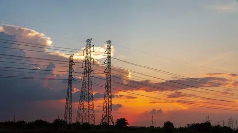 4K Timelapse of high voltage post.High-voltage tower at sunset time.	 Stock Footage 118895381
