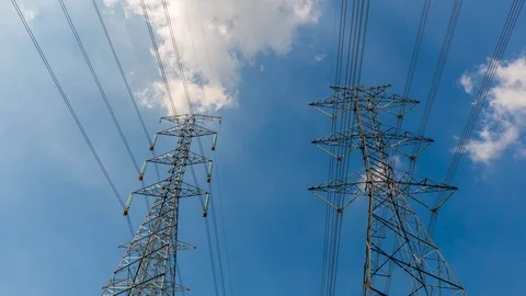 4K Timelapse of high voltage post.High-voltage tower sky background Stock Footage 119873589