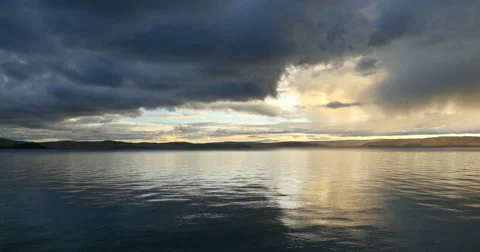 4k timelapse huge clouds mass rolling over lake namtso in morning,tibet. Stock Footage 45581983
