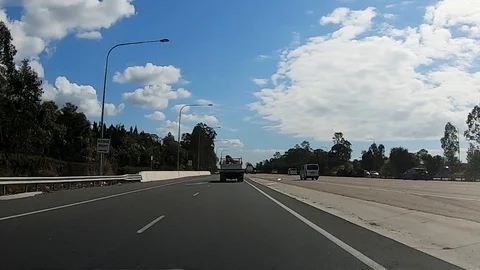 4K Timelapse hyperlapse driving on a four lanes highway in Australia on a sun Stock Footage 115224920