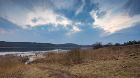 4k timelapse of lake at evening in springtime. Stock Footage 60824661