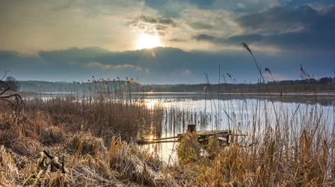 4k timelapse of lake at evening in springtime.  Stock Footage 60825235