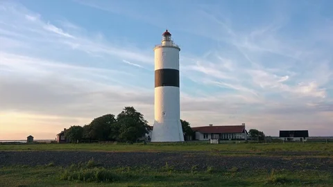 4K Timelapse of Lighthouse at Sunset with Beautiful Sky Stock Footage 83693341