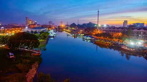 4K Timelapse of Malacca Riverside and Taming Sari Tower during sunrise Stock Footage 105137847