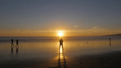 4K Timelapse - Man Watching Ocean Sunset Stock Footage 128936668
