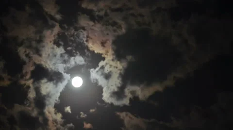 4k Timelapse with moon moving between clouds Stock Footage 52910893