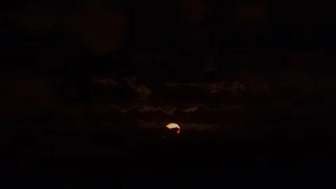 4K Timelapse of moon rinsing over the sea and behind an island. Stock Footage 89268161