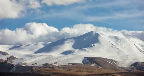 4k timelapse mountain clouds and sky Stock Footage 100142235