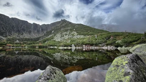 4K timelapse with mountain lake 스톡 동영상 67896591